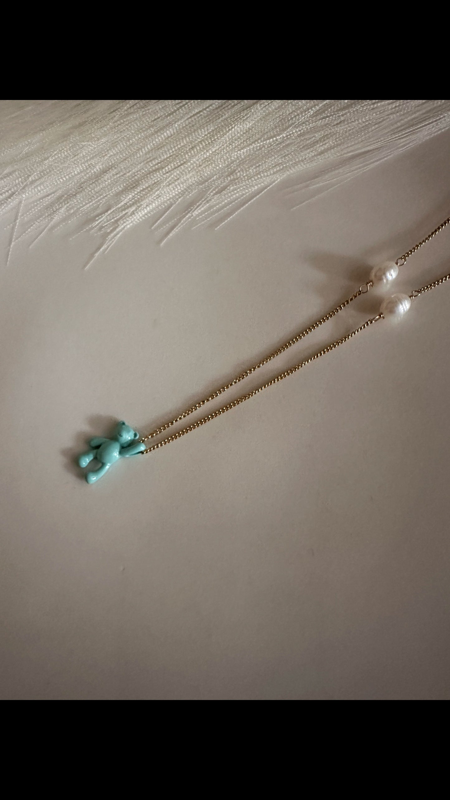 Teal color necklaces